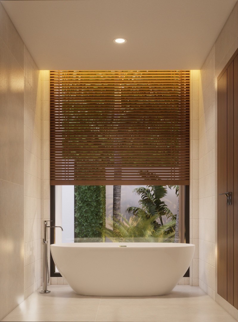 Aerial view of the villa nestled among trees